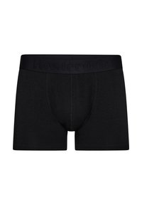 Boxer shorts de algodón negro con una cinturilla suave que presenta un logo de la marca en relieve. El material elástico permite que se estiren y proporciona comodidad en el ajuste.