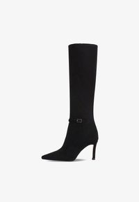 Hoge laarzen zijn de perfecte basis voor elke herfstlook Hoge laarzen zijn de perfecte basis voor elke herfstlook