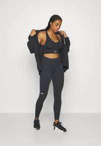 Under Armour TRAIN SEAMLESS - Tights - black/white