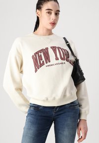 American Eagle Sportska majica - cream