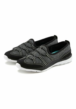 Black and gray slip-on shoes made of textile with elastic accents and a cushioned white sole. Features a textured, woven upper design.
