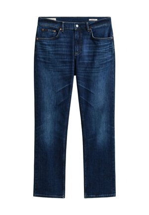 Mørkeblå denimjeans med knappelukking, fem lommer, litt falming på lårene og rette ben.