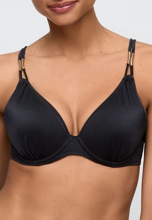 Zwarte driehoekige beha van gladde stof, met dunne verstelbare bandjes en metalen accenten in goudkleur bij de bevestiging van de bandjes.