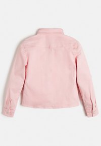 Giacca di jeans rosa chiaro a maniche lunghe vista da dietro, con polsini abbottonati e una semplice cucitura dritta sulle scapole.