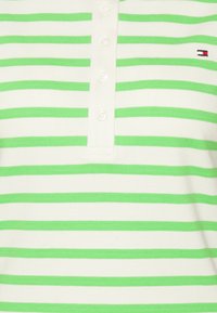 Green and white striped polo shirt with a buttoned placket, featuring textured fabric and a small logo at the chest area.