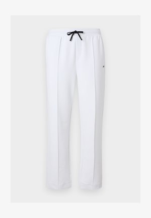 Pantalon blanc à jambes droites avec pli avant, taille élastique, cordon noir et petit détail logo sur la cuisse droite.