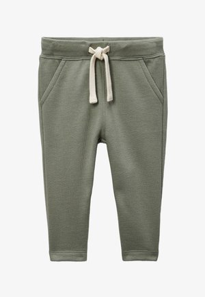 Pantalons de survêtement verts en tissu doux avec une taille à cordon de serrage, dotés de deux poches latérales et de poignets côtelés.