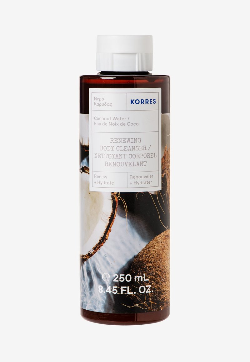 Bruine plastic fles met een witte dop, voorzien van een ontwerp van kokoswater. Het etiket bevat de productnaam en het volume: 250 mL, 8,45 FL. OZ.