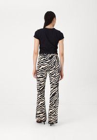 Noisy May NMDESTINY FLARED PANTS  - Hlače - black