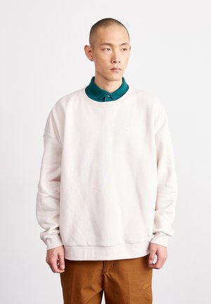 SPORTSWEAR CLUB - Pusa - light orewood