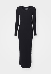 Black ribbed knit dress with long sleeves, a scoop neckline, and side button accents. It features a form-fitting silhouette and side slit.