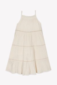 Light ivory sundress with thin straps, tiered design, textured fabric, and subtle horizontal stitching details. Flared hemline.
