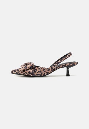 Leopard print slingback shoe with a pointed toe, fabric material, bow detail on the front, and a small black stiletto heel.