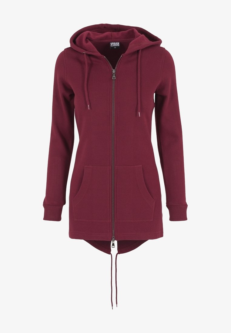 Sudadera con capucha burdeos, con cremallera completa, dos bolsillos frontales, cordón en la capucha y un dobladillo trasero más largo. Textura de tela suave.
