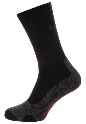 Schwarze Socke mit geripptem Schaft, grauem gepolstertem Fersen- und Zehenbereich, rotem Text auf der Unterseite und einem verstärkten Bogen für zusätzliche Unterstützung.