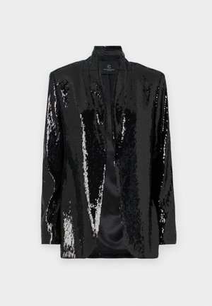 Blazer noir en sequins avec une surface texturée et brillante et un col châle. Conception à l'avant ouvert, forme ajustée et intérieur non doublé.