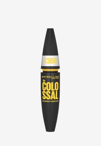 Tubetto di mascara cilindrico nero con finitura opaca, fascia argentata etichettata "fino a 36H" e testo in grassetto giallo che legge "the COLOSSI" e "LONGWEAR MASCARA."