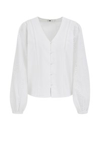 Blouse blanche à col en V avec fermeture à boutons. Manches longues bouffantes ornées de broderies ajourées. Tissu en coton lisse.