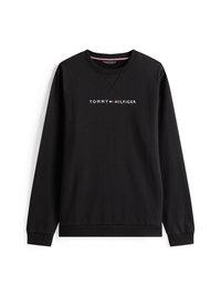 Melna kokvilnas sporta krekls ar apaļu kakla izgriezumu. Iekļauj "TOMMY HILFIGER" logo baltā krāsā, centrāli novietots. Piedurknes un apakša ir ribotas.