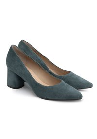 Décolleté verde in suede con punta affilata e tacco a blocco. Superficie liscia e design minimalista che offrono un aspetto raffinato.