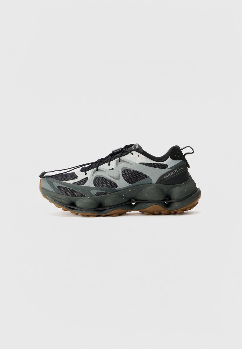 Black and grey athletic shoes with mesh upper, sculpted sole, and rubber outsole. Features a secure lace system and pull tab at the heel.