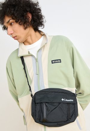 STREET TRANSIT™ SIDE BAG UNISEX - Cross body bag - black