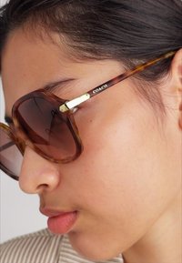 COACH Gafas de sol - caramel/snow