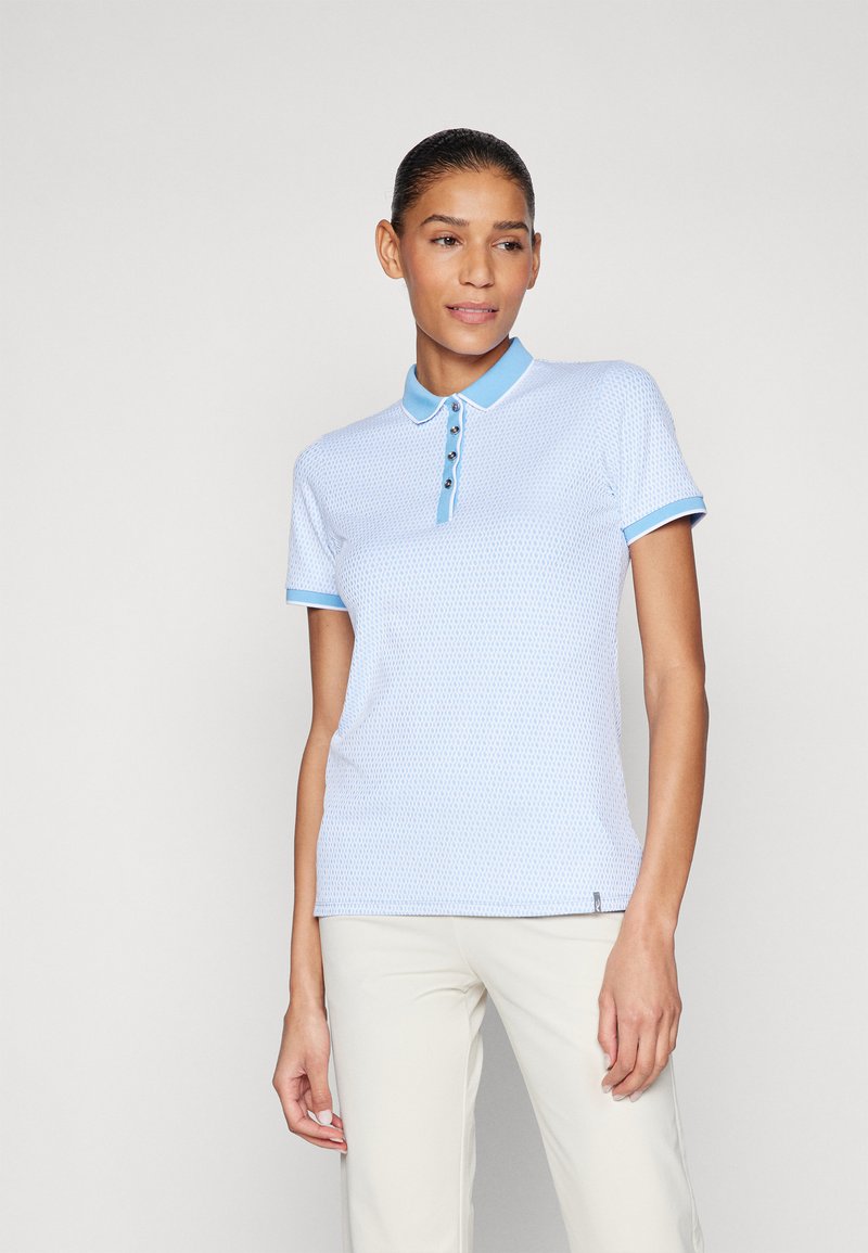 Jasnoniebieska koszulka polo z teksturowanym wzorem, kontrastowym kołnierzykiem i mankietami. Posiada cztery guziki na listwie i dopasowany krój.