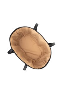 Sac fourre-tout noir avec un intérieur en tissu beige et quatre poignées noires, vu d'en haut avec l'intérieur entièrement visible.