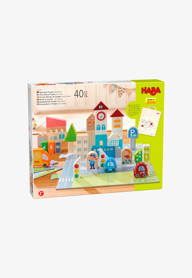 Sada světového puzzle, která obsahuje barevné dřevěné budovy, auta, dopravní značení a silnici, na zelené základně. Obsahuje 40 kusů.