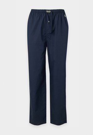 Pantaloni da pigiama blu navy con vita elastica, apertura con bottoni e piccolo logo sul lato sinistro vicino alla vita.