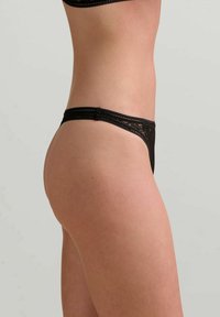 Wolford String - black