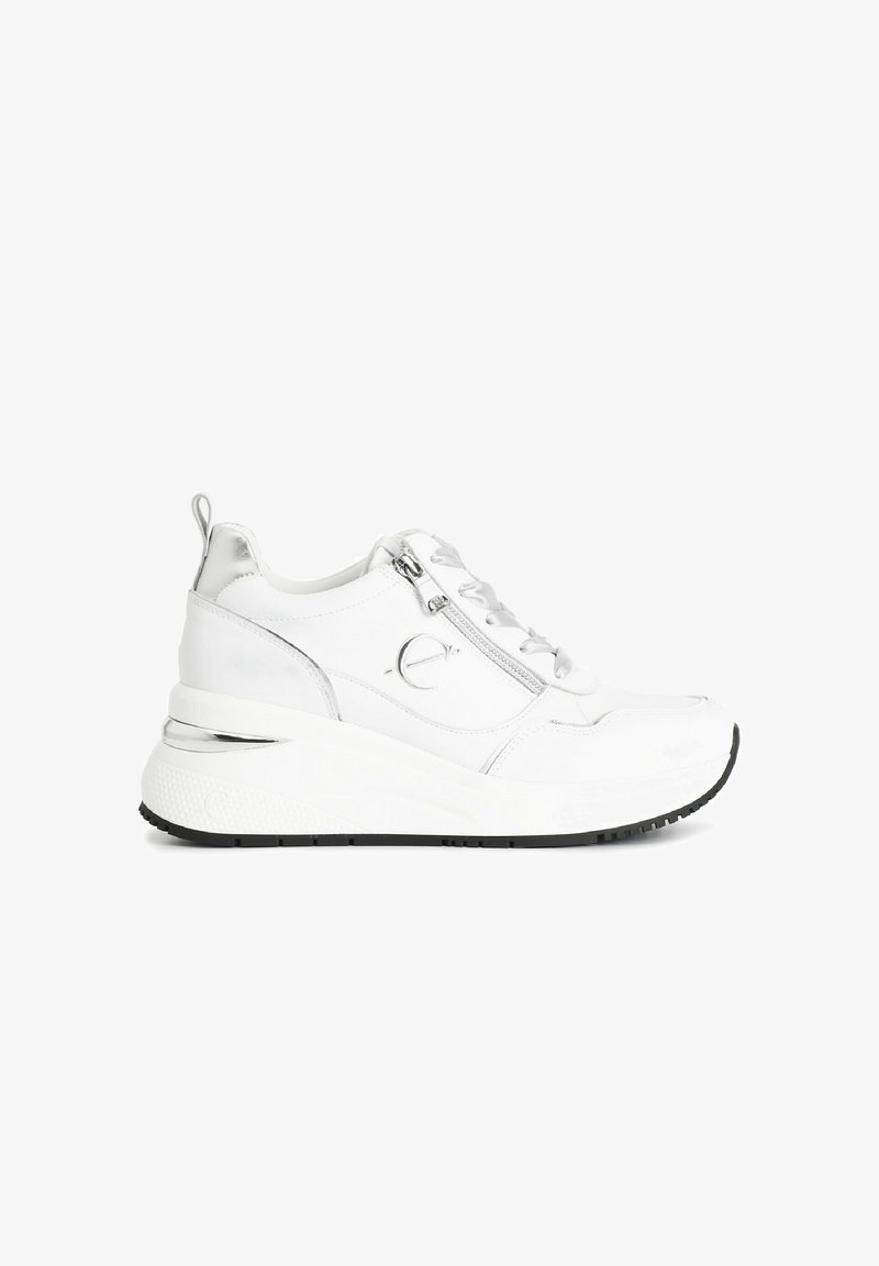 White leather sneakers with silver accents, a chunky sole, lace and zipper closure, and textured detailing on the midsole. Black rubber outsole.