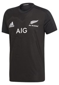 T-shirt sportivo nero realizzato in tessuto leggero. Caratterizzato dal logo Adidas, dal branding "AIG" e dal testo "ALL BLACKS". Collo a giro, maniche corte.