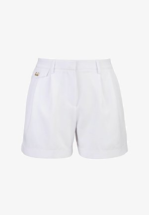 White tailored shorts with side pockets, featuring a subtle sheen, pleated front, and a small gold logo accent on the waistband.