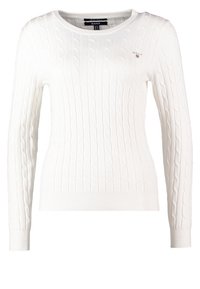 Maglione bianco a maglia con motivo a trecce, scollatura rotonda e maniche lunghe. Presenta polsini e orlo a costine, con un piccolo logo sul petto.