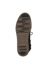 Sole di una scarpa marrone con un motivo di battistrada testurizzato, impugnature in gomma nera con particelle dorate, e il numero di taglia 37 visibile al centro.