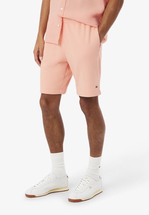 Pantalones deportivos - rose corail-ui
