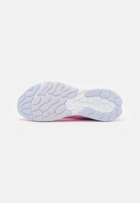Shoe sole featuring a pink upper with a textured rubber base and multi-directional pattern, transitioning to a light purple and white outsole.
