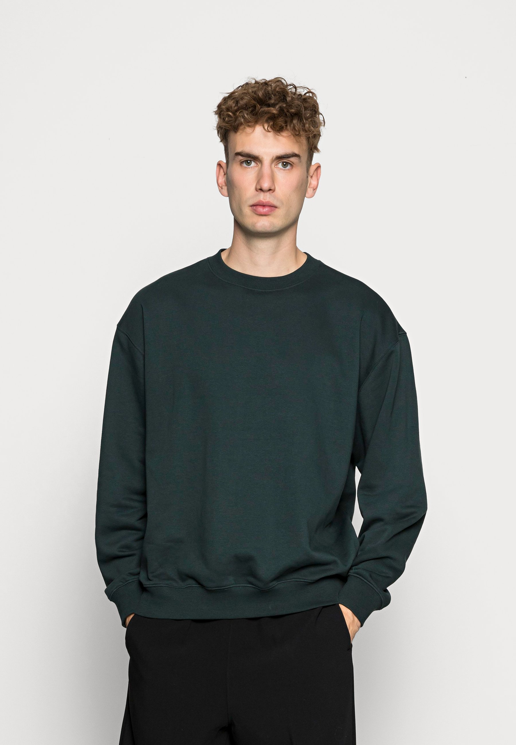 dark green pullover