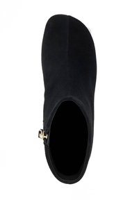 Black ankle boot featuring a smooth suede texture, pointed toe, and a side zipper with gold hardware for easy wear.