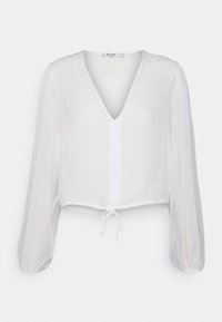 Blusa branca, corta com decote em V, mangas longas e volumosas, e fecho frontal com laço. Feita de um tecido leve e texturizado.