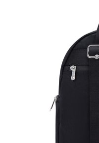 Black nylon backpack with a smooth texture, featuring silver hardware, side zipper pocket, and adjustable strap. Curved top design.