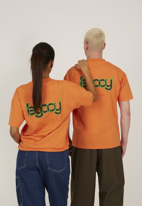 UNISEX - Print T-shirt - pastel orange