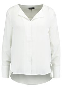Blusa bianca a maniche lunghe da donna con bottoni frontali nascosti, colletto a punta e orlo leggermente curvo, più lungo sul retro.
