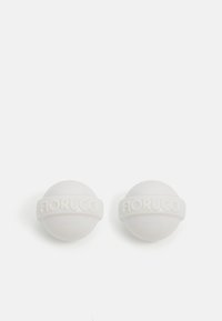 White spherical earrings with embossed "Fiorucci" band, featuring a smooth, glossy finish. Simple design with no additional patterns or accents.