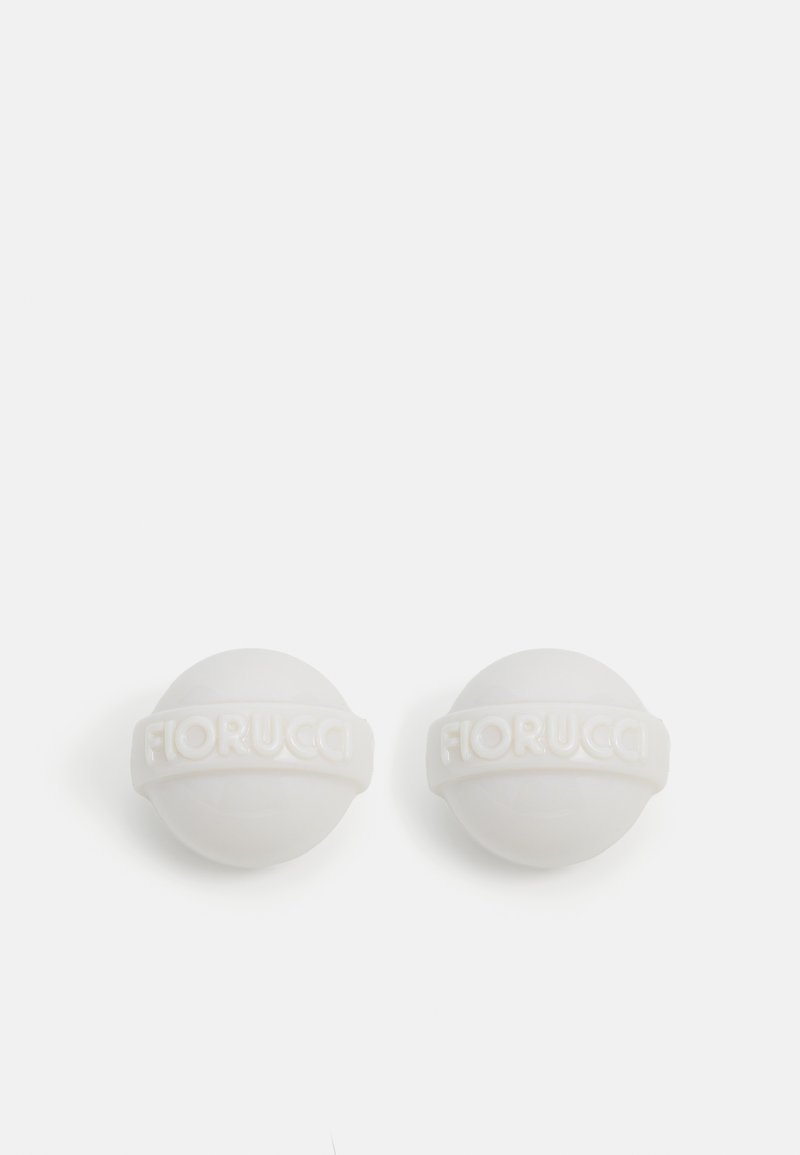 White spherical earrings with embossed "Fiorucci" band, featuring a smooth, glossy finish. Simple design with no additional patterns or accents.