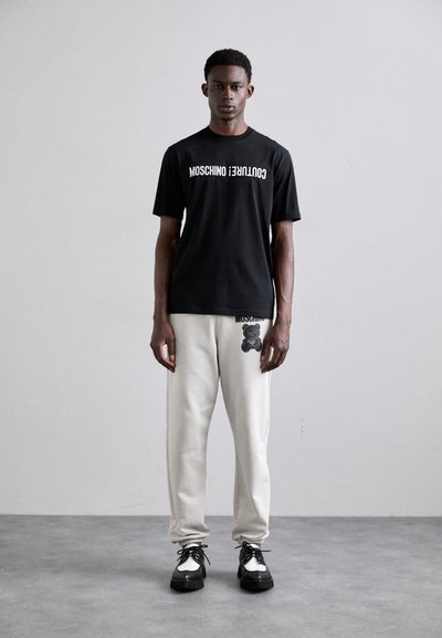 MOSCHINO Μπλουζάκι με στάμπα - fantasia nero