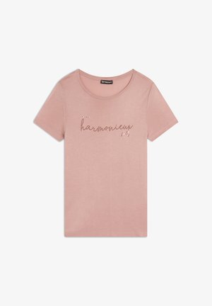 T-shirt in cotone rosa con maniche corte, caratterizzato da ricamo della scritta "harmonieuz" in filo metallico. Girocollo, texture morbida.