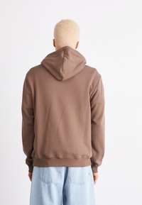 adidas Originals Jersey con capucha - earth strata